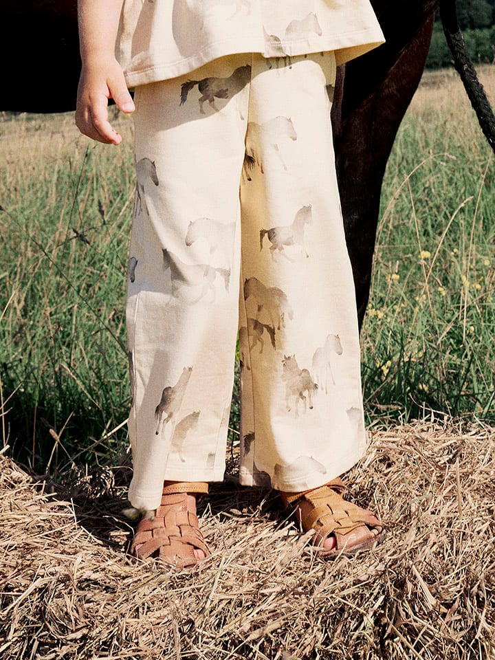 name it Spodnie "Helva" w kolorze żółtym rozmiar: 110