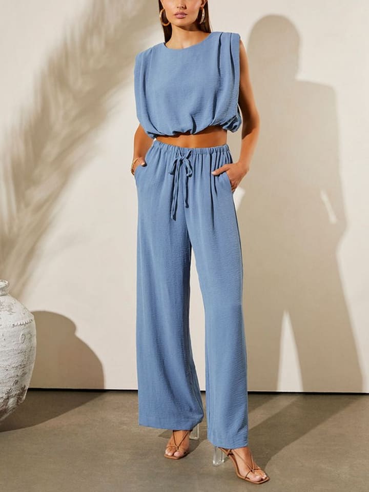 Milan Kiss Spodnie w kolorze błękitnym rozmiar: XL