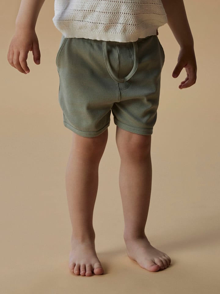 Lil Atelier Szorty "Gago" w kolorze jasnozielonym rozmiar: 110