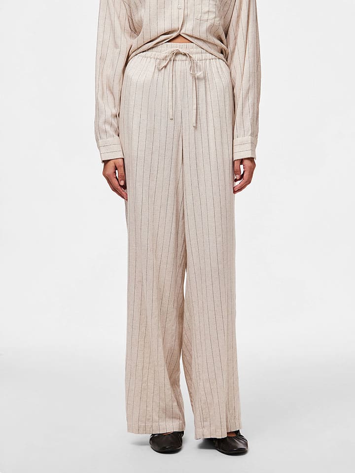 Pieces Spodnie "Pia" w kolorze beżowym rozmiar: M