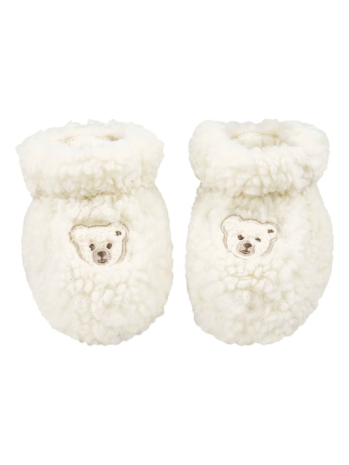 Steiff Kapcie w kolorze kremowym rozmiar: 56-68