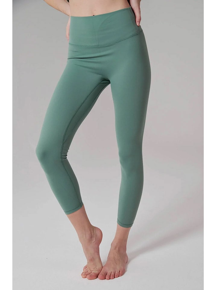 Onamaste Legginsy sportowe w kolorze zielonym rozmiar: S/M