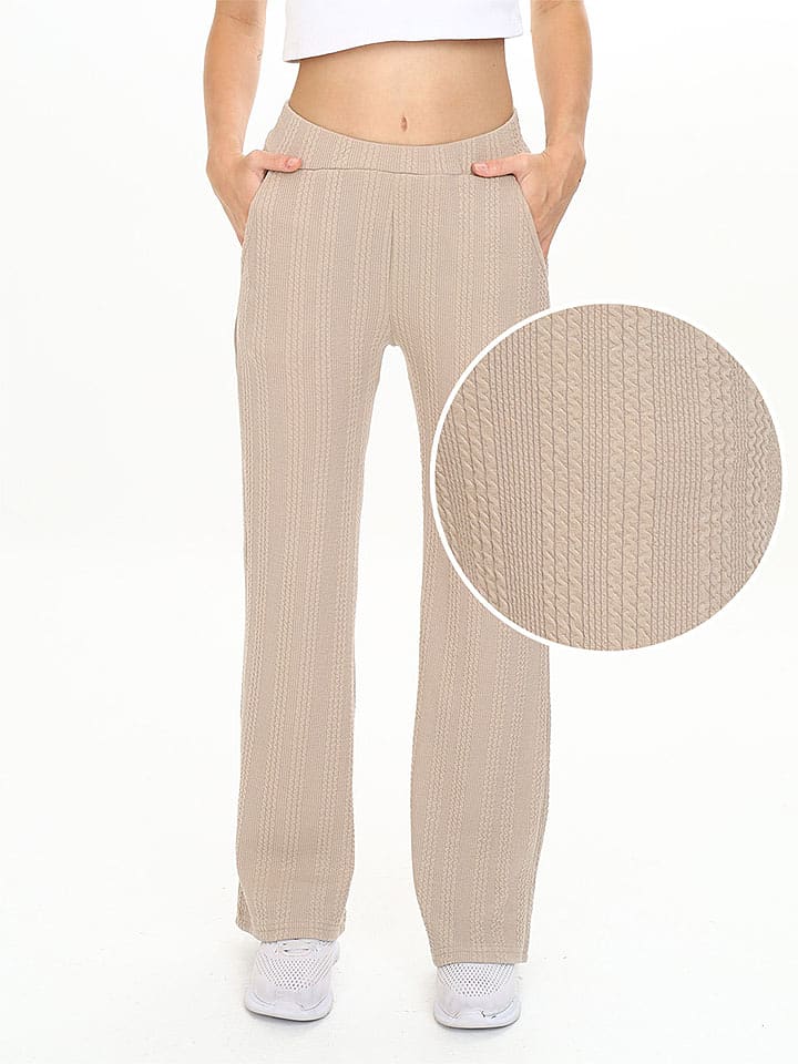 Denokids Spodnie dresowe w kolorze beżowym rozmiar: 116