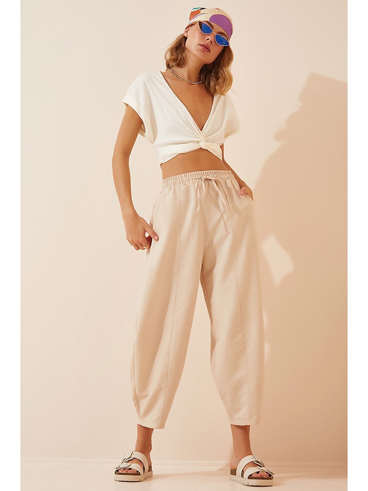 Happiness Istanbul Spodnie w kolorze beżowym rozmiar: 40