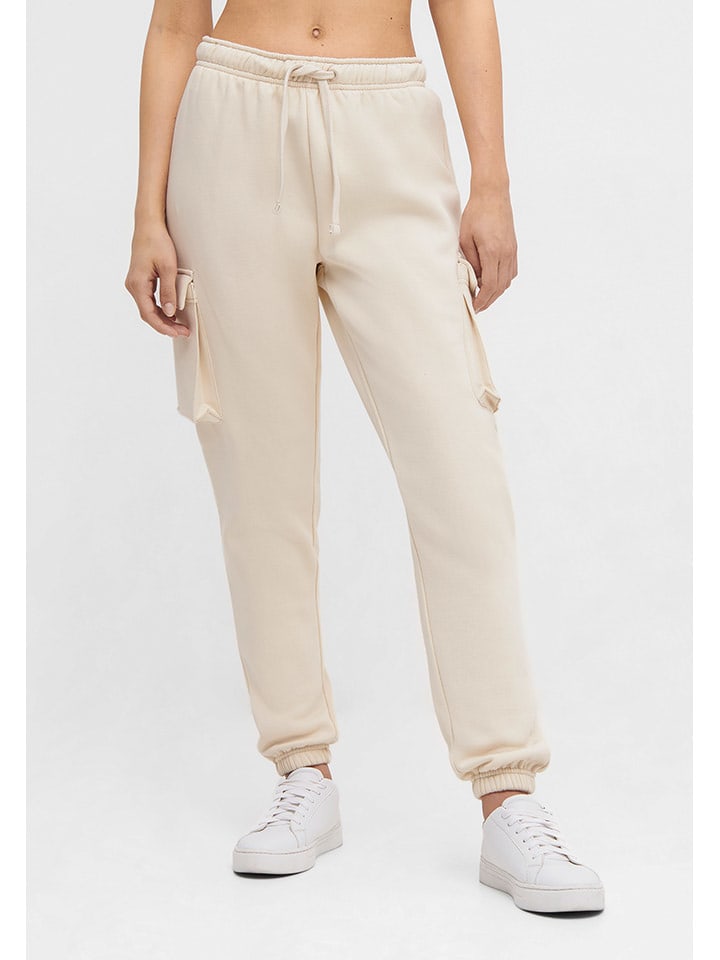Bench Spodnie dresowe "Liat" w kolorze beżowym rozmiar: 44