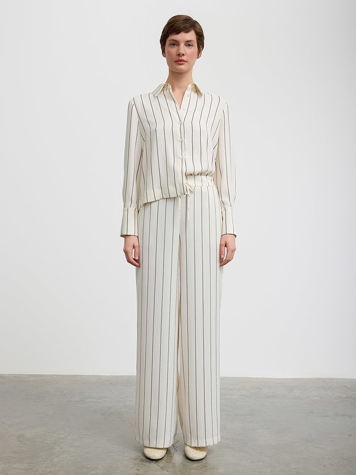 BGN Spodnie w kolorze kremowo-czarnym rozmiar: 38