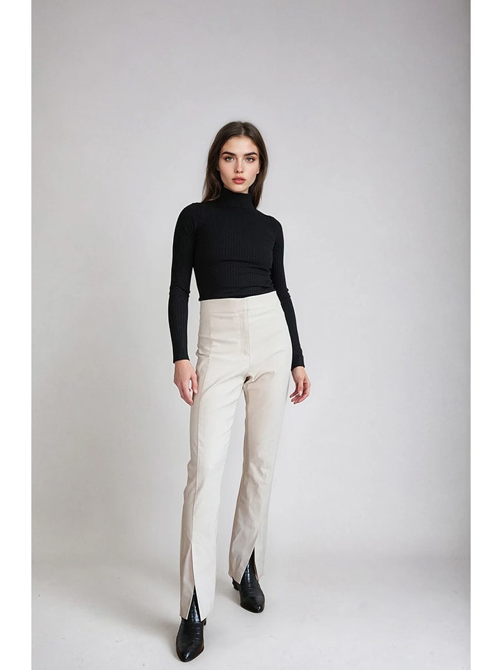 Monki Spodnie w kolorze kremowym rozmiar: 48