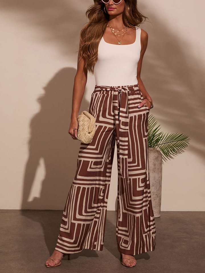 Milan Kiss Spodnie w kolorze brązowo-kremowym rozmiar: M