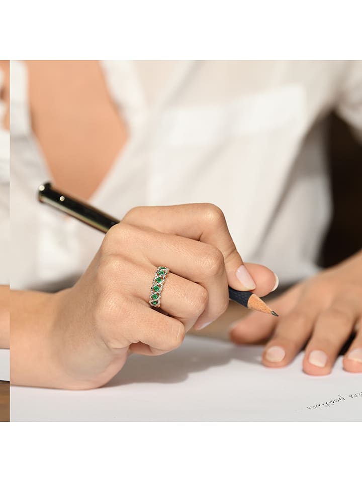 DIAMOND & CO Złoty pierścionek "Green Tarlac" z diamentami rozmiar: 52