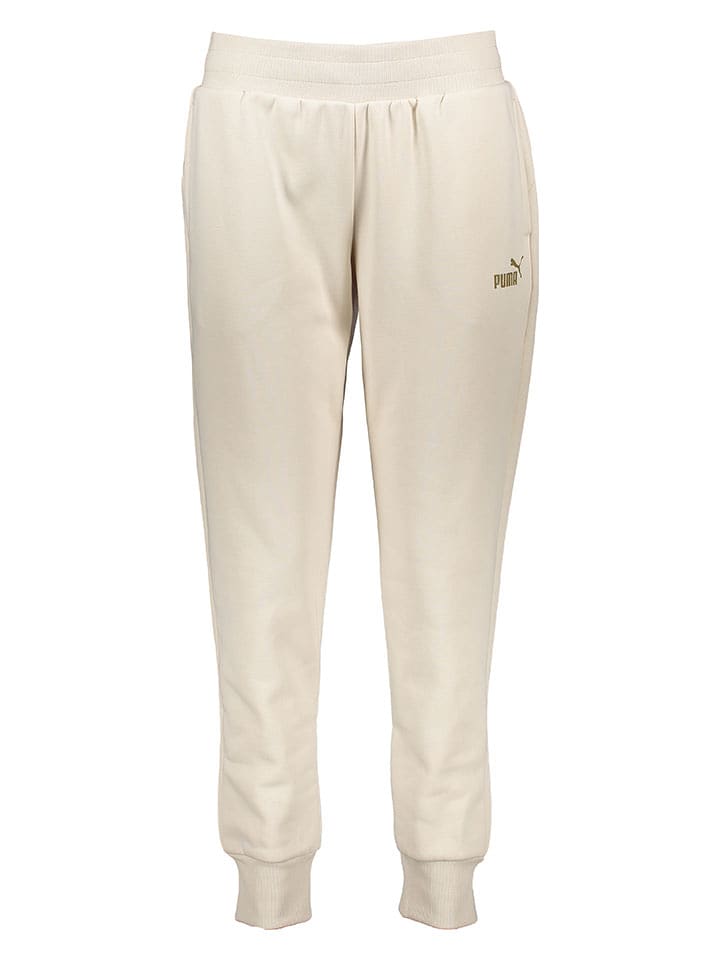 Puma Spodnie dresowe "Essentials+" w kolorze beżowym rozmiar: XL