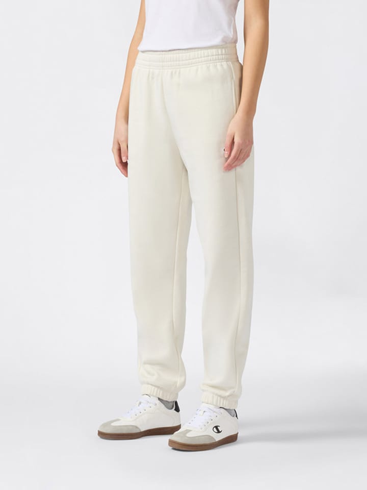 Champion Spodnie dresowe w kolorze kremowym rozmiar: M