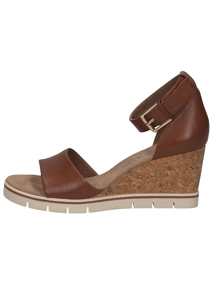 Caprice Skórzane sandały w kolorze jasnobrązowym na koturnie rozmiar: 39