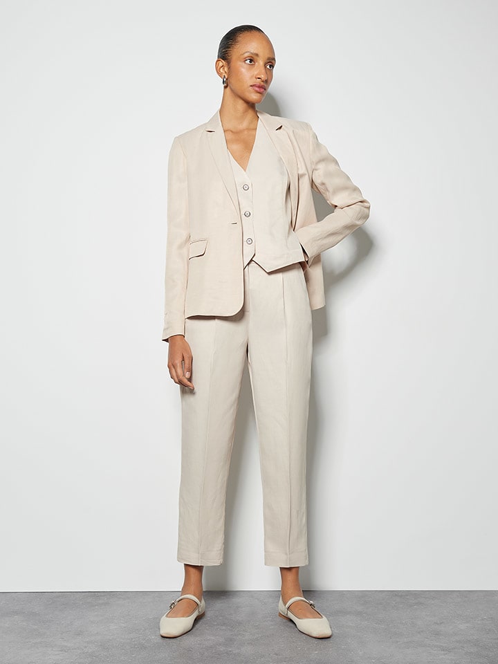 Someday Spodnie w kolorze kremowym rozmiar: 42