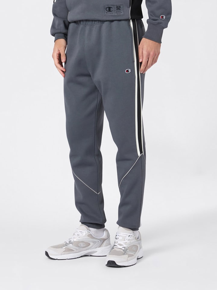 Champion Spodnie dresowe w kolorze szarym rozmiar: L