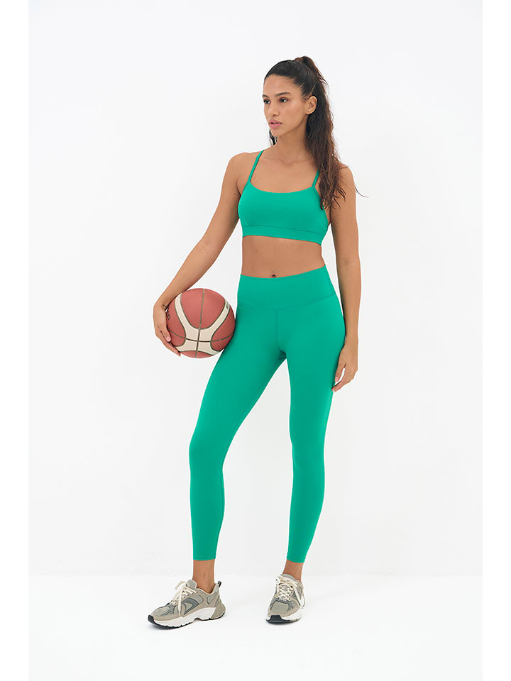 Onamaste Legginsy sportowe "Geneva" w kolorze zielonym rozmiar: L/XL