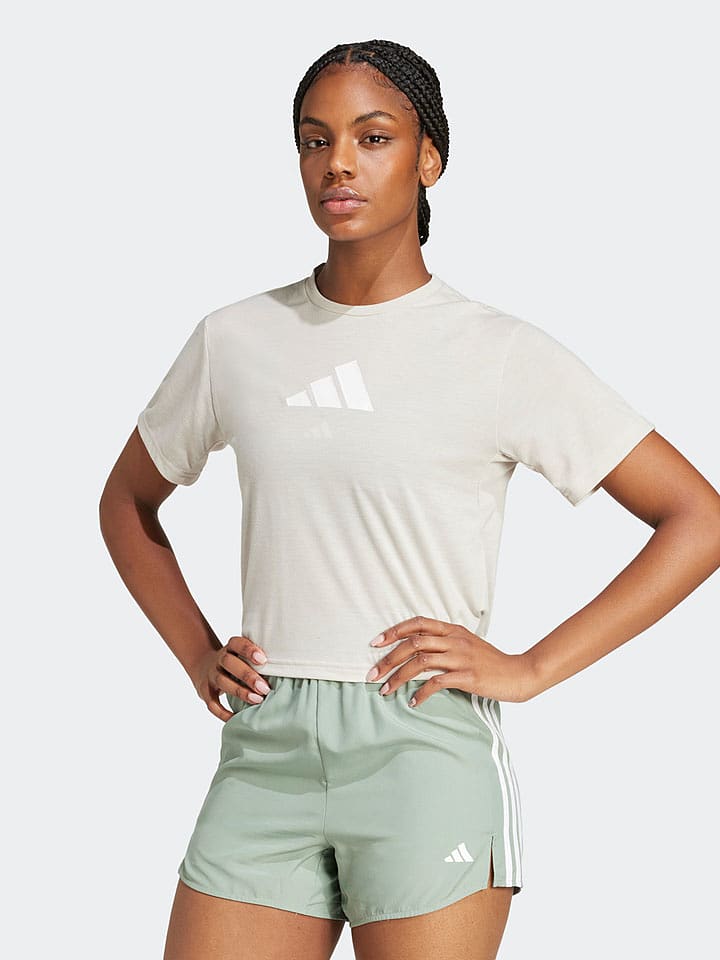 adidas Koszulka w kolorze kremowym rozmiar: XS