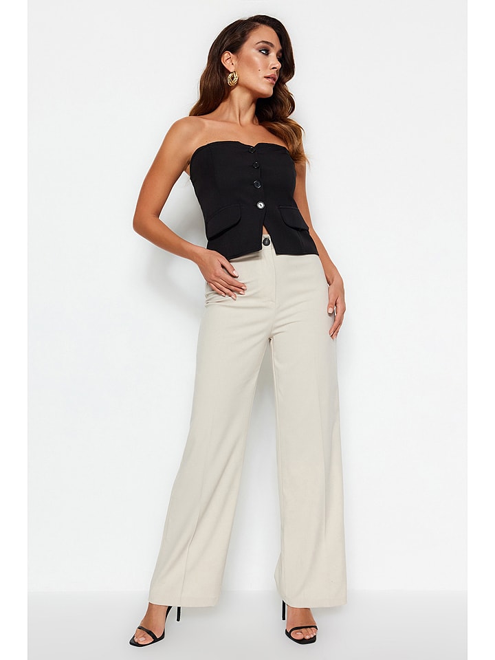 trendyol Spodnie w kolorze kremowym rozmiar: 42